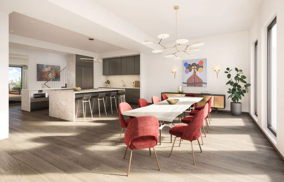 Rendering of the penthouse dining room with red upholstered chairs, a long dining table and a sculptural brass chandelier beside the kitchen at Nolita Luxury Penthouse, 260 Bowery Street, Nolita, New York City, interior design by Alexandra Peck Design